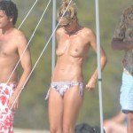 Heidi Klum topless in Corsica