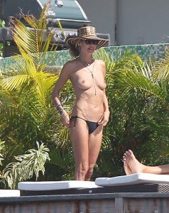 Heidi Klum goes topless on her Caribbean holiday